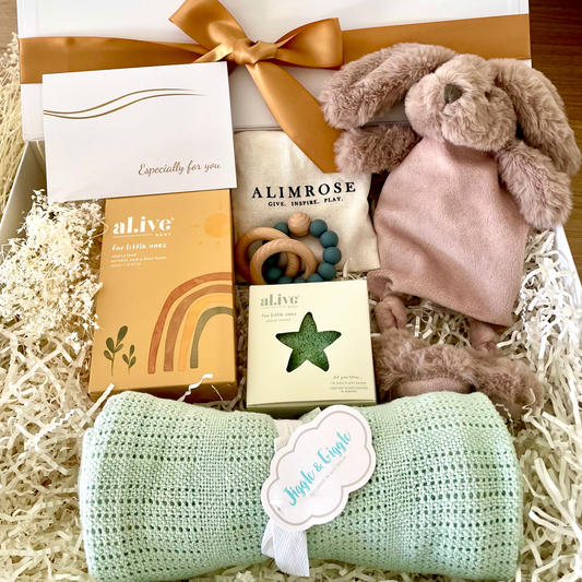 Best gift hamper for a new baby with a little comforter and gorgeous al.ive products for hair and body wash. Jiggle & Giggle plush toys and blankets and Alimrose beechwood & silicon teether. New born baby gifts. Free delivery Australia wide