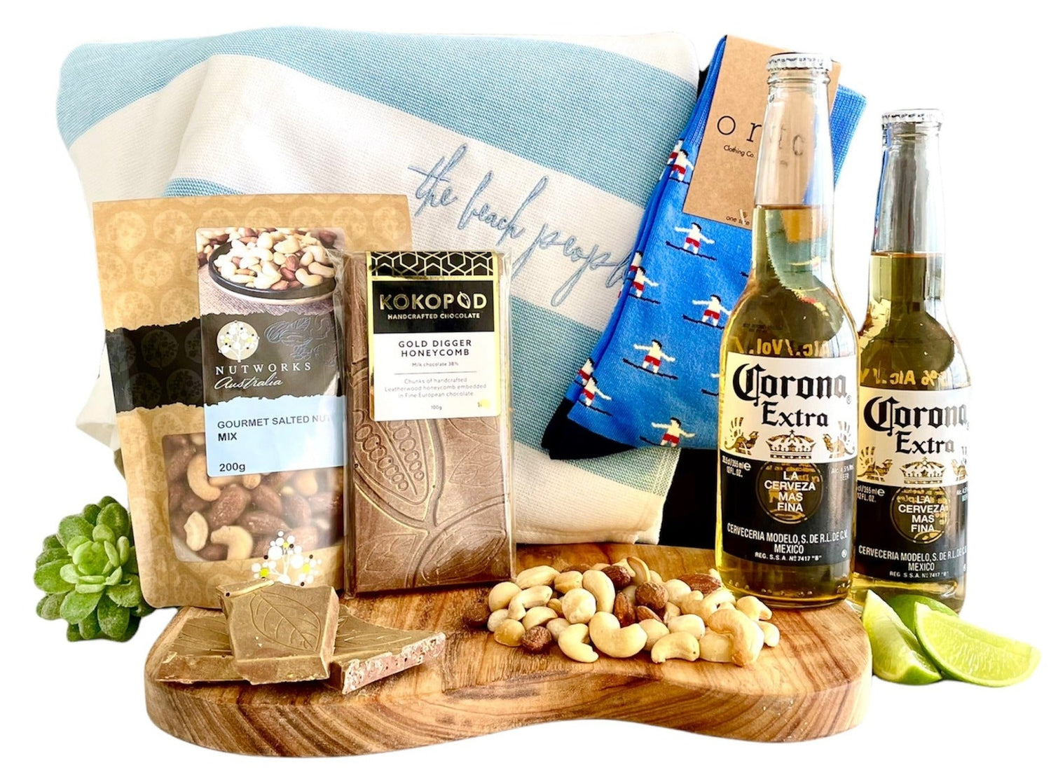 Best Hampers for men, boyfriend, dad, uncle or brother with The Beach People Sand Free Towel and Surfer Socks. Celebration gift for him to enjoy the Beach, Coronas Beer, Gourmet Nuts and Kokopod's favourite Honeycomb littered Chocolate. From the Beach to the office he'll love it.